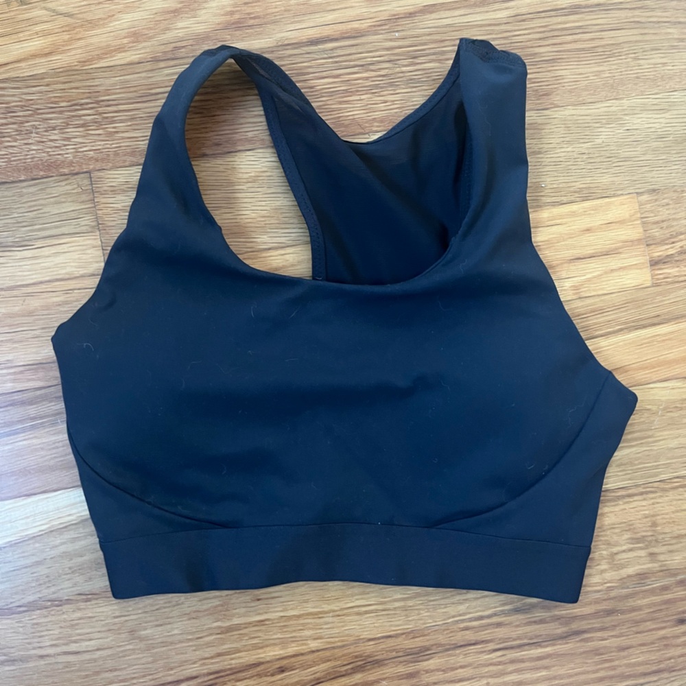 New balance sports bra with phone pocket. Never worn